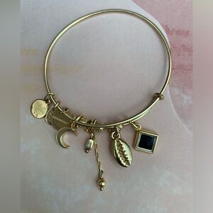 Gold Alex and Ani charm bracelet